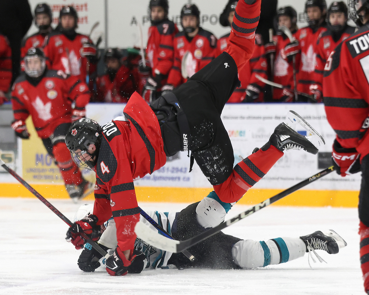 LINDSAY, ON : Ryan O'Dell of the Niagara Falls Canucks collides with a Lindsay Muskie in the neutral zone during the second period at the Lindsay Recreation Complex on January 24, 2025. (Photo by Tim Bates / OJHL Images)
