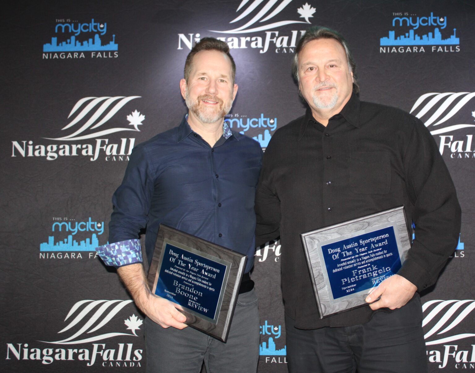Brandon Boone, left, and Frank Pietrangelo of the Niagara Falls Canucks