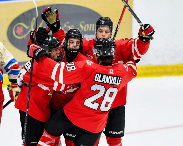 Nicolas Glanville and the Niagara Falls Canucks celebrate a goal, 2026-27. (Photo by OJHL Images)